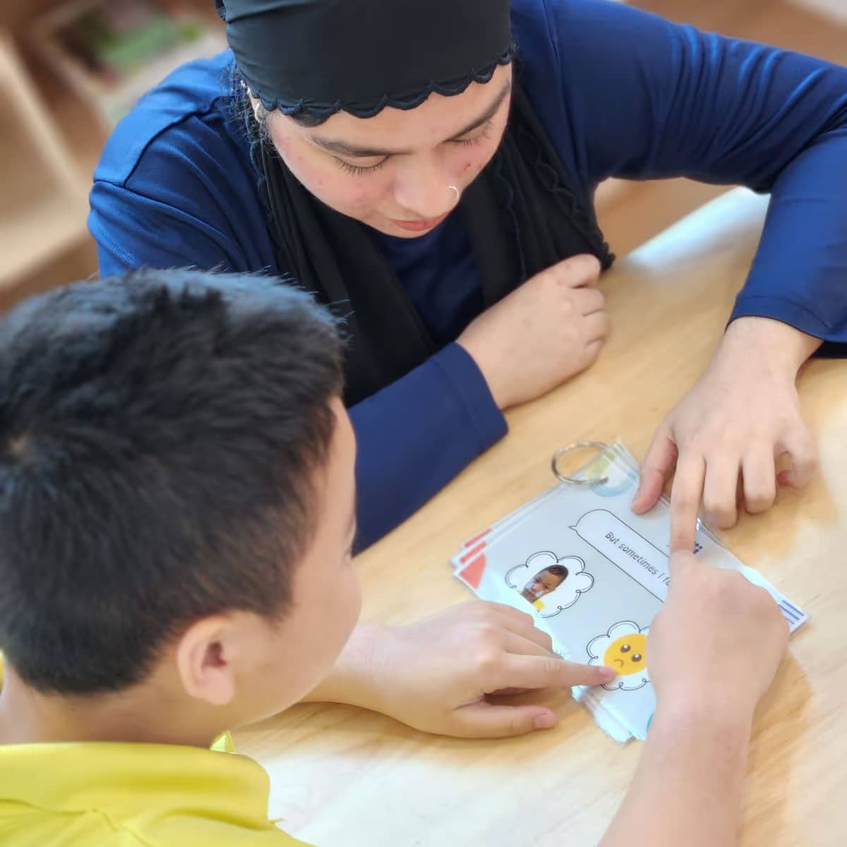Our Programme Page - Teacher and student